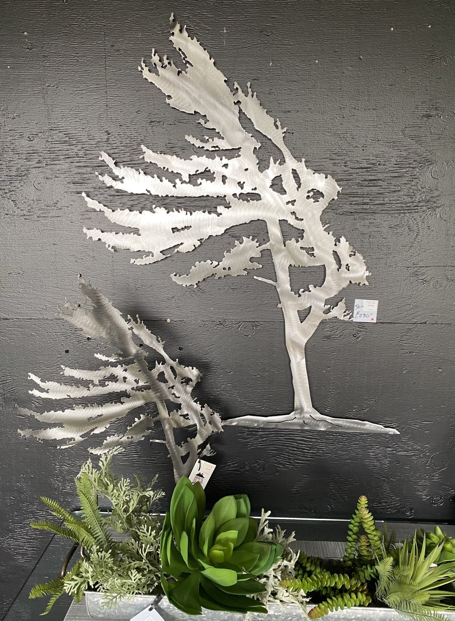 tree art on metal stand
